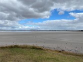 The lake was half empty with extensive areas of mud and water, likely very shallow in the center area of the lake. The exposed lake floor appeared to be mud as opposed to salt pan, which I have seen in the past. There has been an exceptionally dry March w